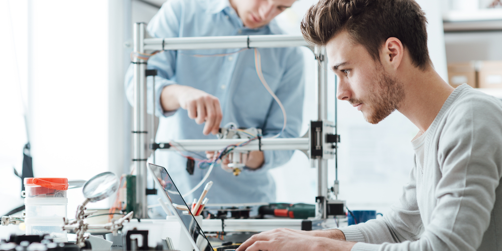 Students work on a computer science project.